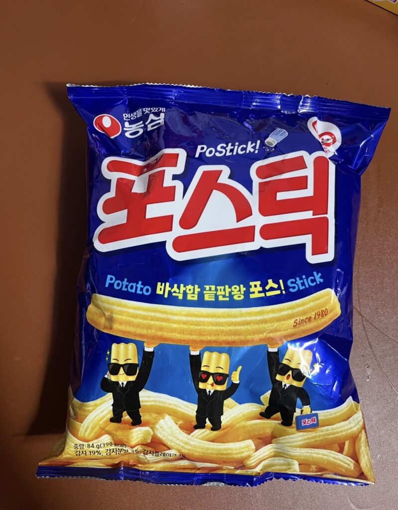 a deep blue nongshim postick bag with a bold red logo. the clean design gives a simple first impression.