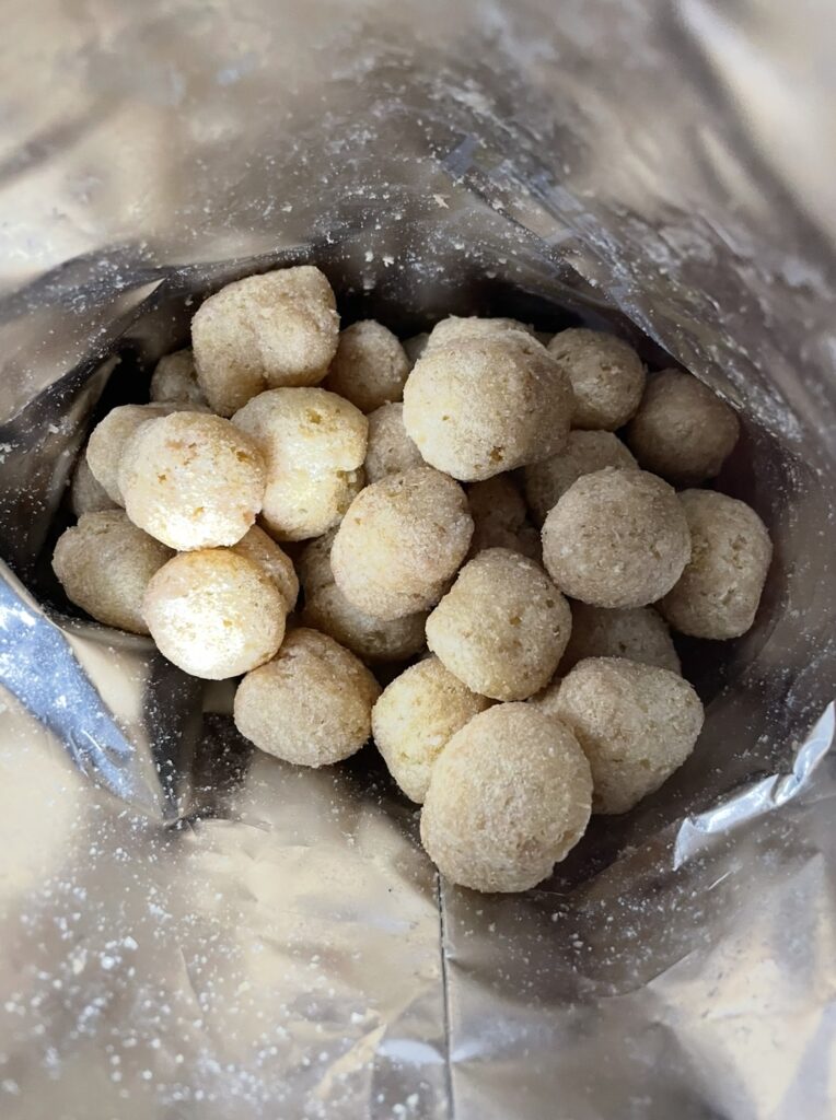 A look inside the opened bag showing the amount and shape of the snacks, helpful for people searching Where to buy Korean snack and wanting to see the actual contents