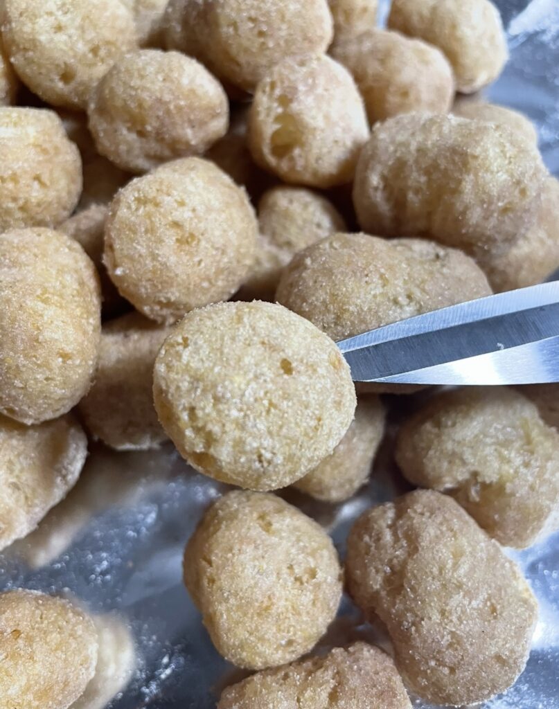 A close-up shot showing the texture and surface details of the snack, perfect for a detailed Korean snack review