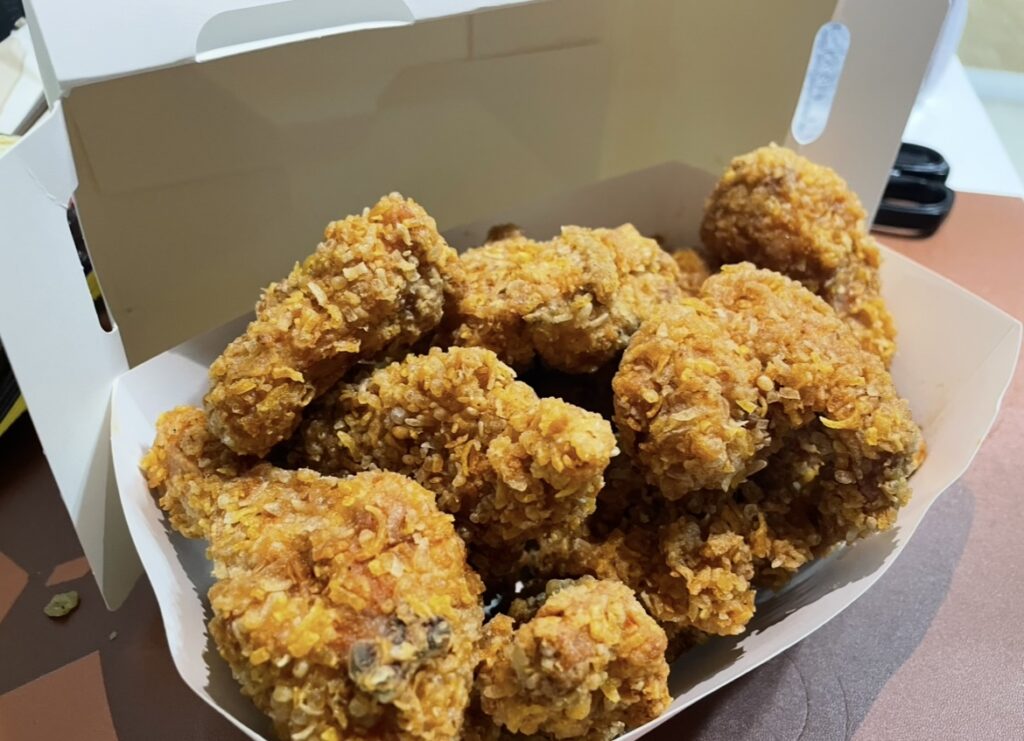 inside view of the bhc quasakking box, showing real chicken pieces for those looking for where to buy korean chicken