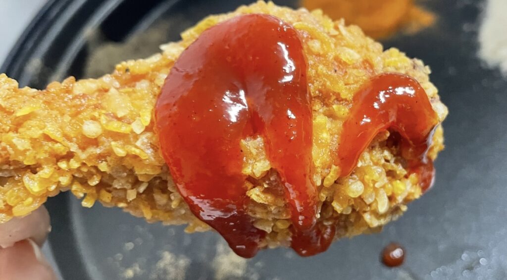 close-up of the bhc quasakking coating, clearly showing the crispy texture often mentioned in a korean chicken review