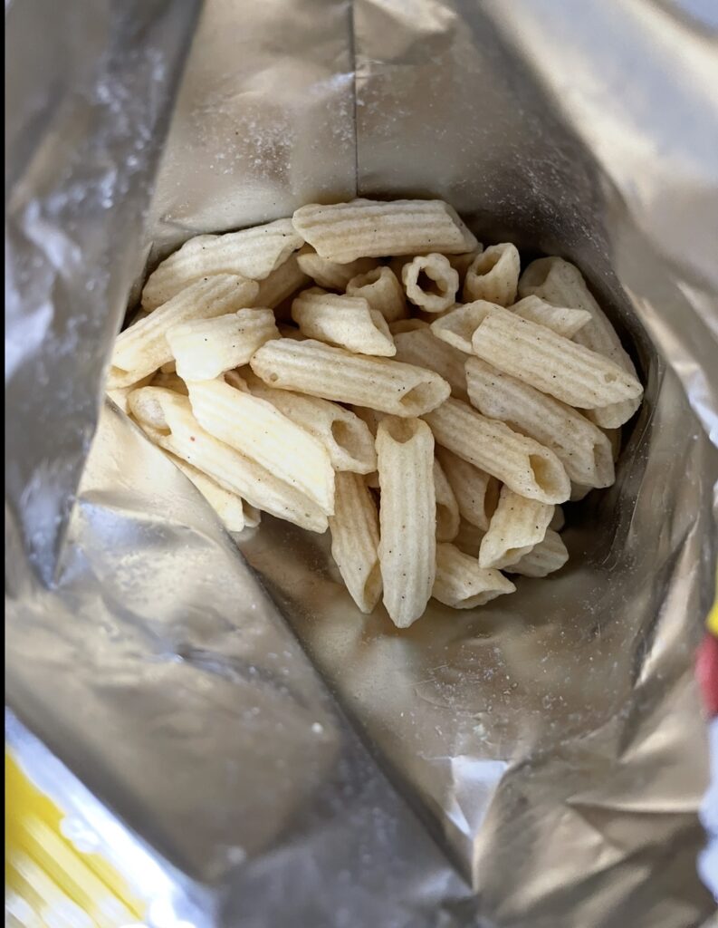 an opened bag showing thick, evenly coated potato pieces with a soy sauce–pepper seasoning, giving a realistic view for those searching where to buy korean snack item