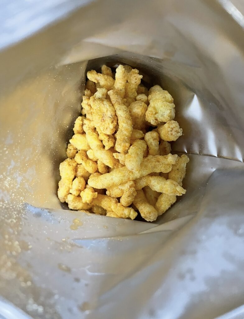 an opened bag showing the actual amount and shape of the snack pieces inside, helpful for anyone searching where to buy korean snack and wanting to see real contents