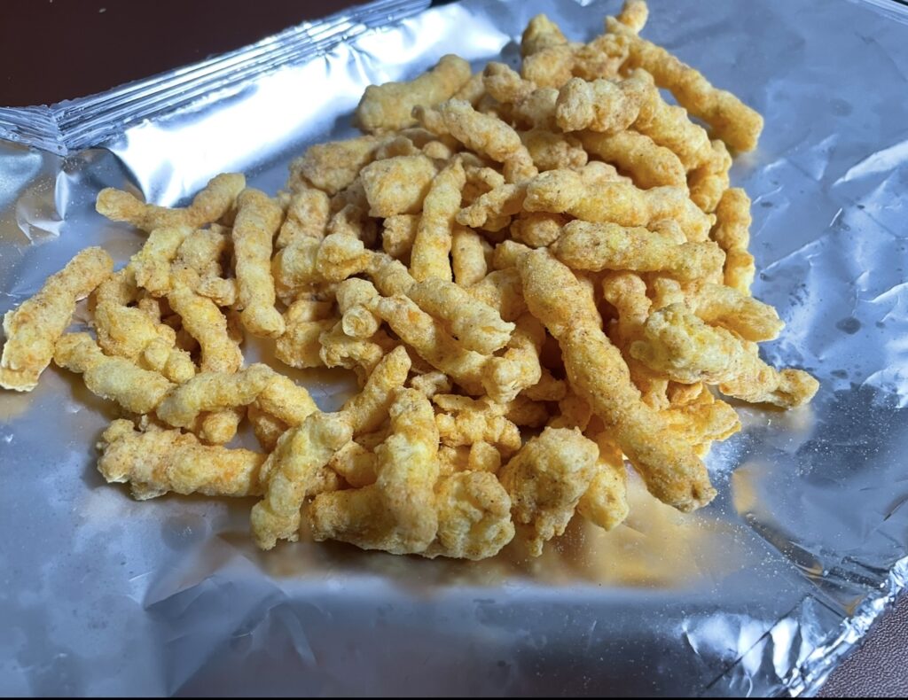 a fully opened bag with the snacks spread out, highlighting their texture and color for those interested in exploring korean snack flavors