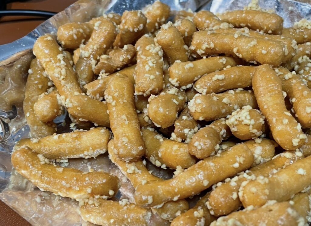 an extreme close-up shot revealing the crunchy texture and sticky coating, visually supporting the details mentioned in this korean snack review.