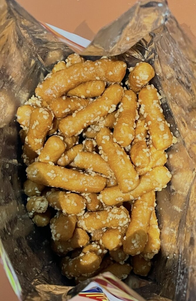 a view inside the open foil bag filled with plenty of brown crunchy snacks, showing the actual product you get when you search where to buy korean snack.